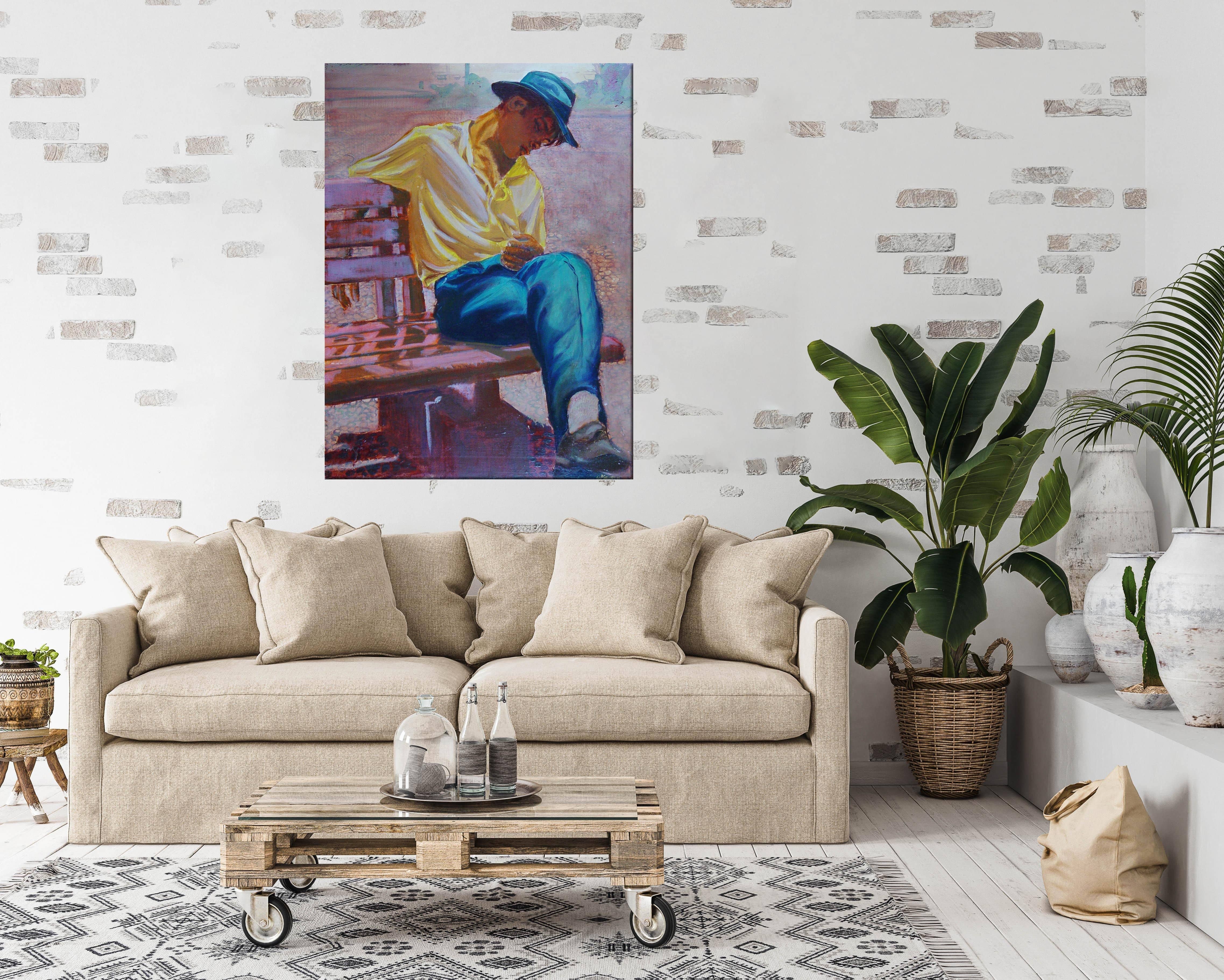 Painting of younger boy pictured in Soneca displayed on the wall in rustic living room setting